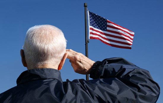 veteran saluting flag