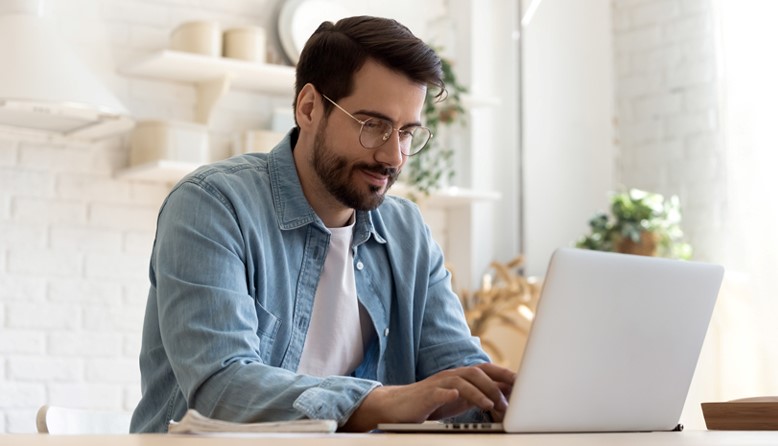 man using laptop computer