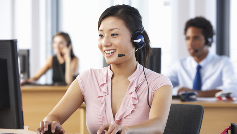 Call center workers on phone