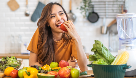 Woman eating fruit
