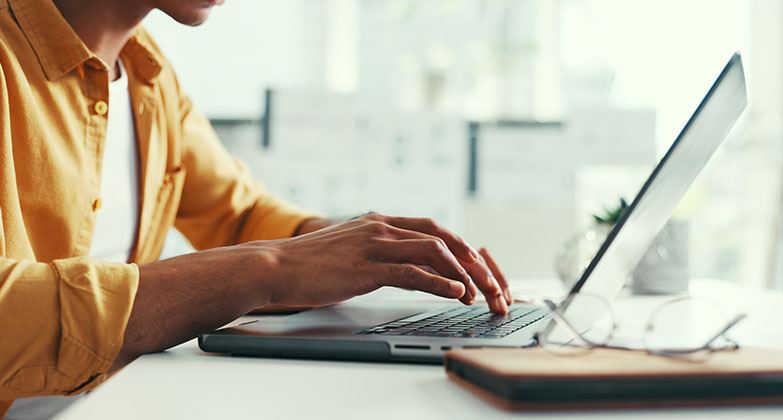 man using laptop
